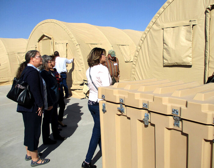 Visitors touring equipment